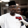 A health official uses a handheld infrared thermometer on a passenger arriving at Murtala Muhammed International Airport in Nigeria. A health official uses a handheld infrared thermometer on a passenger arriving at Murtala Muhammed International Airport in Nigeria.