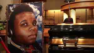 The casket of Michael Brown sits inside Friendly Temple Missionary Baptist Church in St. Louis, awaiting the start of his funeral in August.