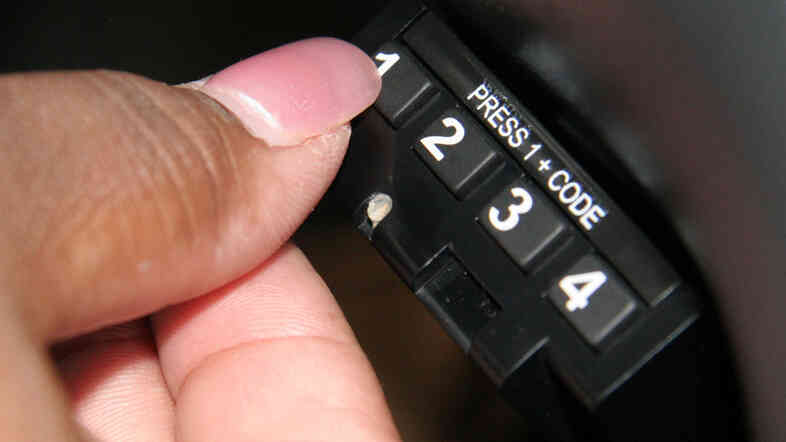 A borrower enters a code into a starter interrupt device installed in a car in Limerick, Pa.