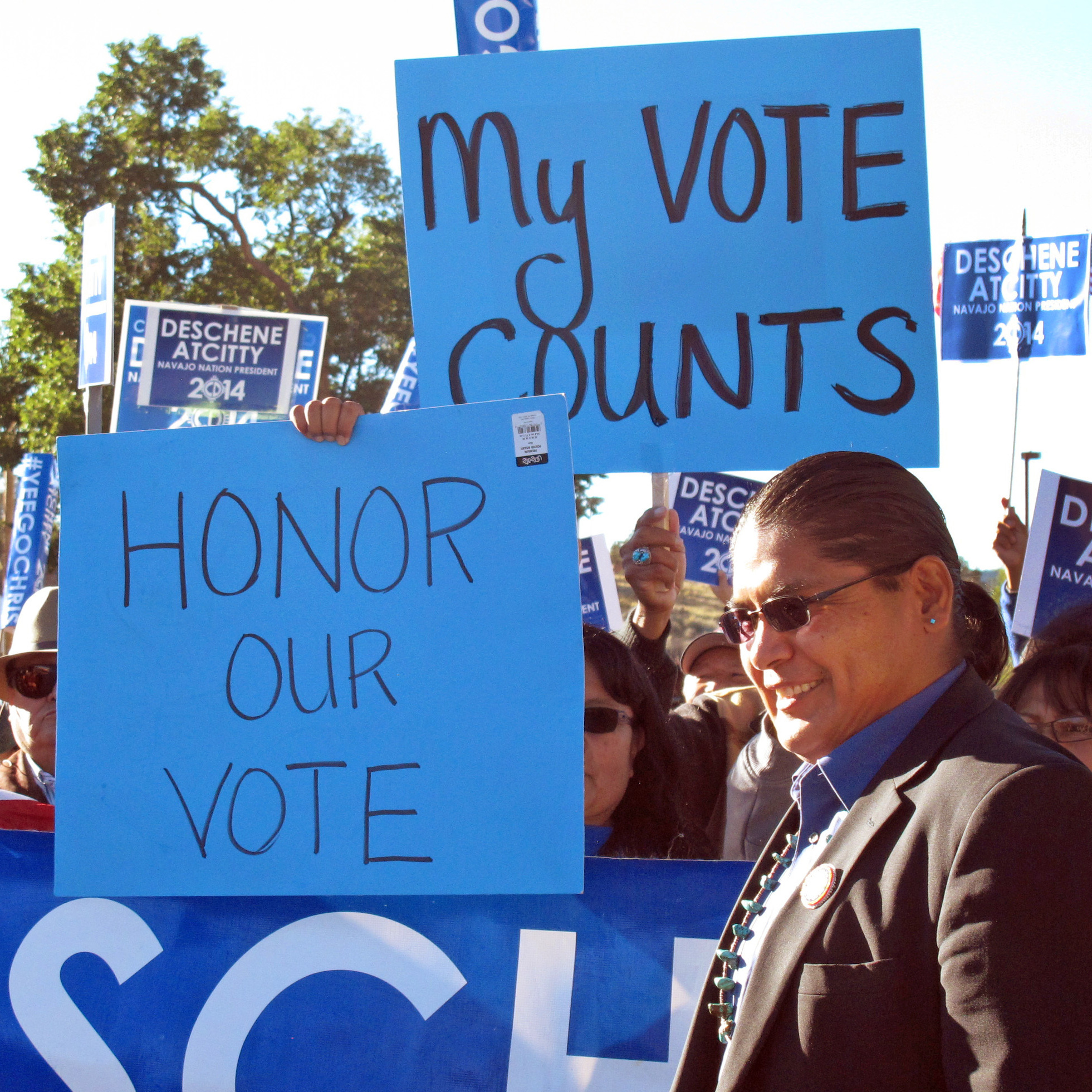 Navajo presidential candidate Chris Deschene greets supporters ahead of a hearing in Window Rock, Ariz., to determine whether Deschene is fluent enough in Navajo to qualify for the presidency.