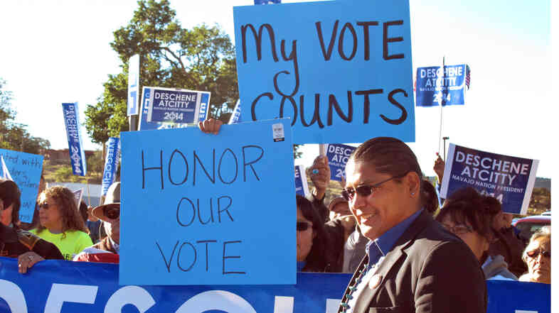 Navajo presidential candidate Chris Deschene greets supporters ahead of a hearing in Window Rock, Ariz., to determine whether Deschene is fluent enough in Navajo to qualify for the presidency.