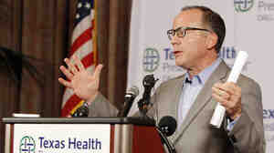 During a news conference on Sunday, Texas Health Presbyterian Hospital Chief Clinical Officer Dr. Daniel Varga answers questions about a health care worker who now has Ebola after providing care for Thomas Eric Duncan. Varga is expected to testify before a House panel looking into Ebola response.