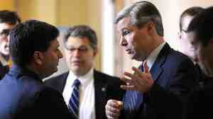Ron Klain (left), then chief of staff for Vice President Joe Biden, talks with Sen. Sheldon Whitehouse on Capitol Hill in December 2009.