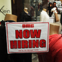 A notice in a store window in New York City announces a retail job opening. Now that unemployment has slipped below 6 percent, there's renewed interest in what the Federal Reserve's target for joblessness should be.