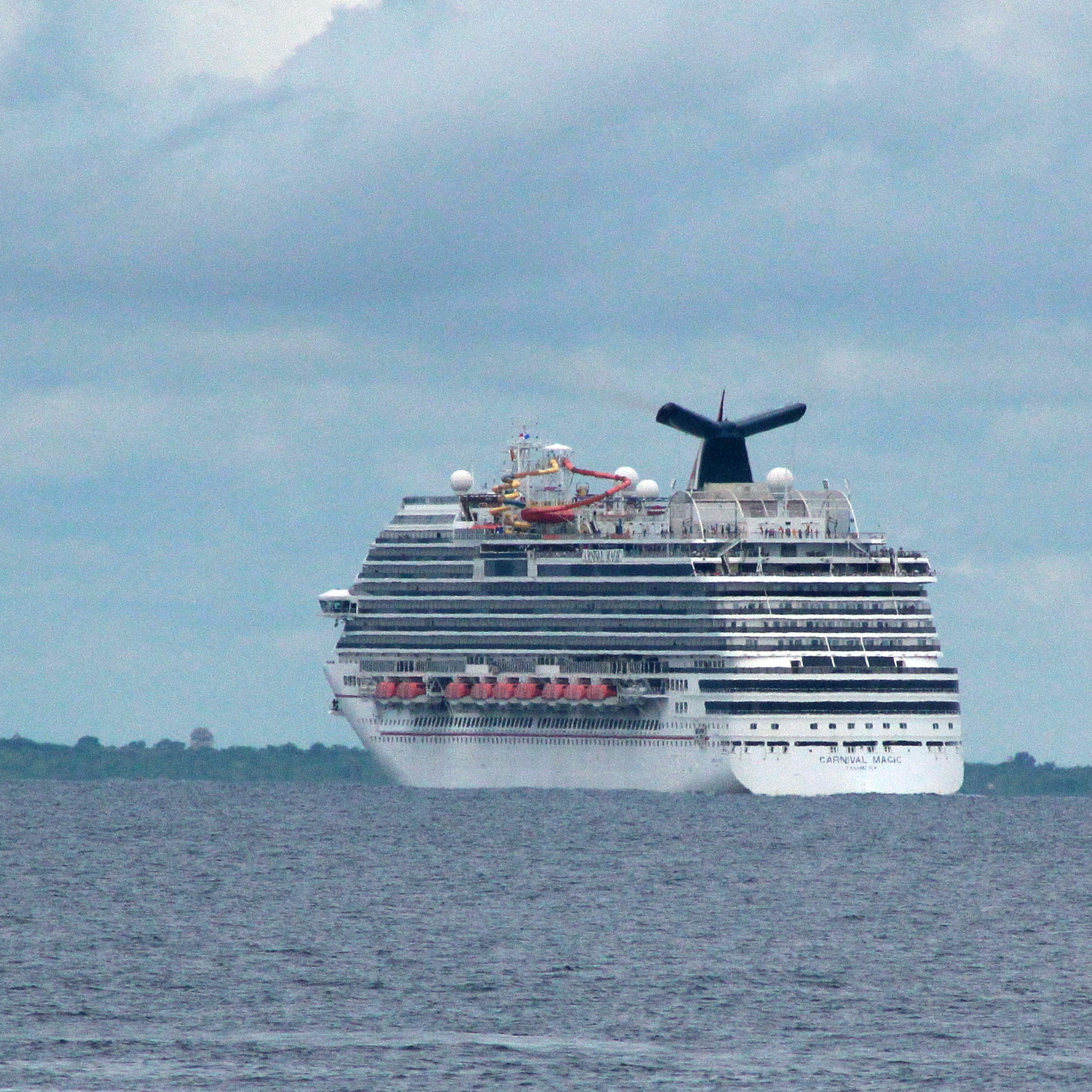 The cruise ship Carnival Magic passes near Cozumel , Mexico, on Friday.