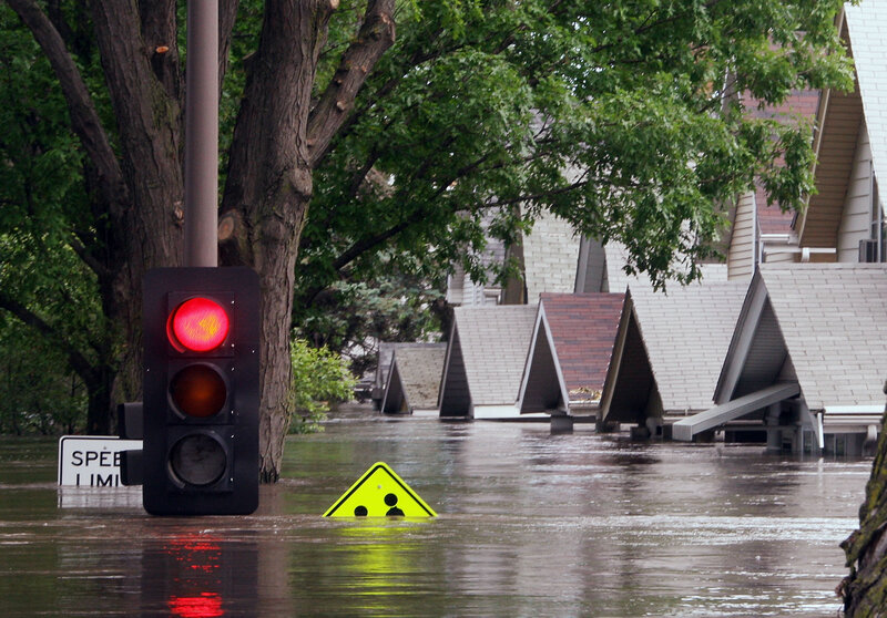 A flooded street in Cedar Rapids, Iowa. In the summer of 2008, the city ordered evacuations as Cedar River rose.