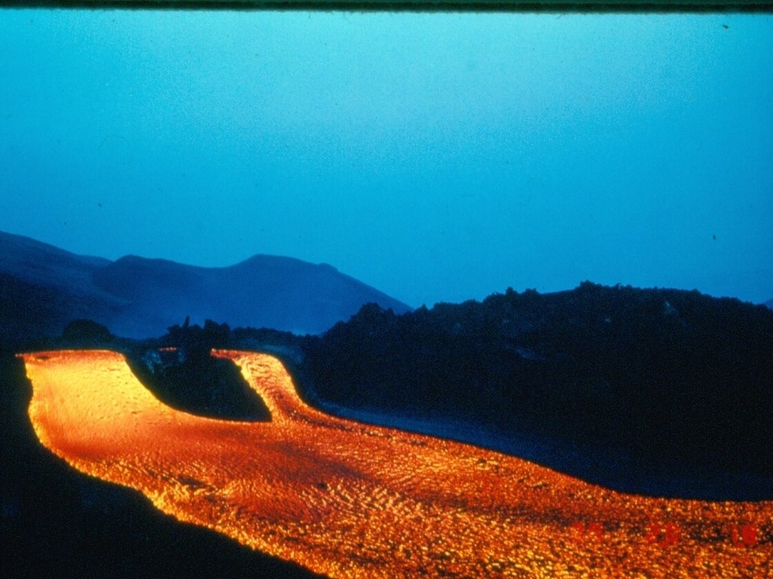 Mt. Etna erupted on March 28, 1983. Lava flows destroyed homes and tourist destinations causing millions of dollars worth of damage. Teams scrambled to divert the massive flow.
