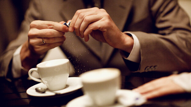 This coffee drinker prepares to sprinkle some of what very well may be, in the words of one character, a "party in a packet." This coffee drinker prepares to sprinkle some of what very well may be, in the words of one character, a "party in a packet."