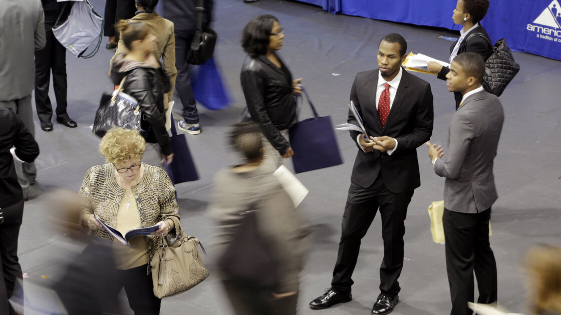 Job hunters line up for interviews at an employment fair in New York City. The unemployment rate tells only a partial story about the U.S. labor market.