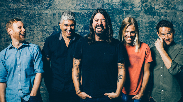 Dave Grohl, center, with The Foo Fighters (Brantley Gutierrez)
