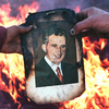 Romanians burn a portrait of Nicolae Ceausescu in Denta on Dec. 22, 1989, as residents take to the streets to celebrate the downfall of the dictator.