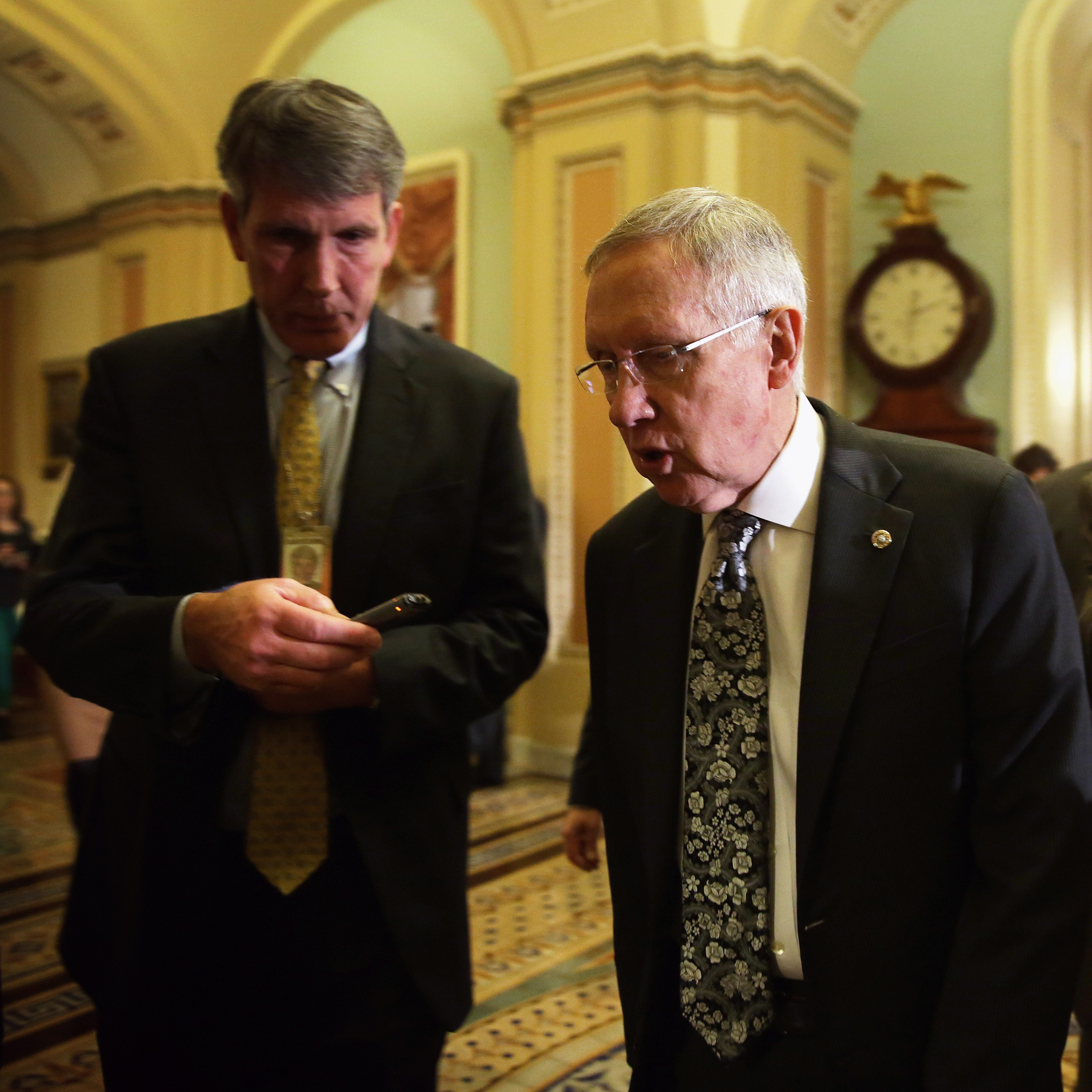 U.S. Senate Majority Leader Sen. Harry Reid, shown walking towards the Senate chamber on December 16, pushed through a final batch of judicial nominees this month, before the Republican-dominated Senate takes over in the new year.