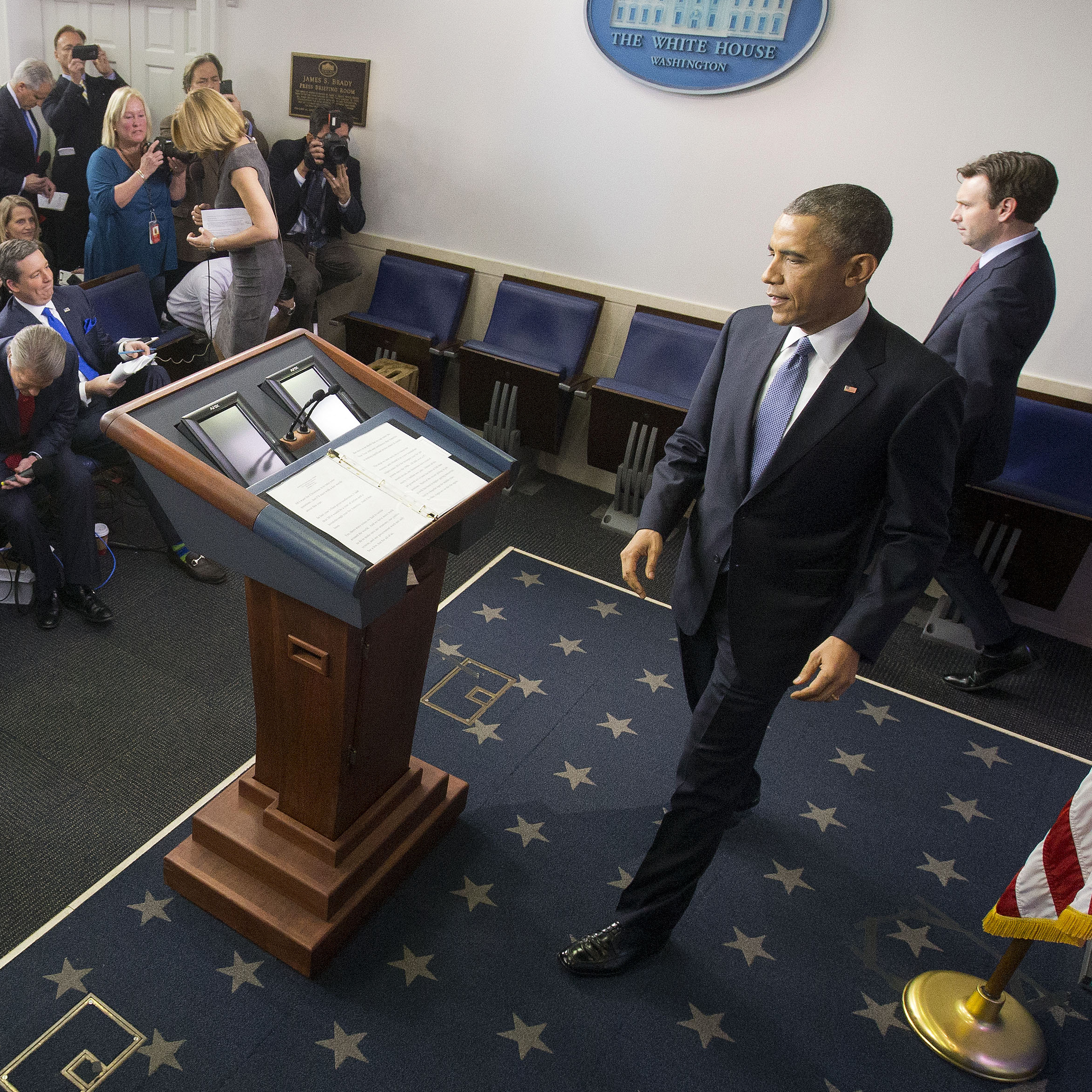 President Obama arrives for a news conference Dec. 19 in the Brady Press Briefing Room of the White House in Washington.