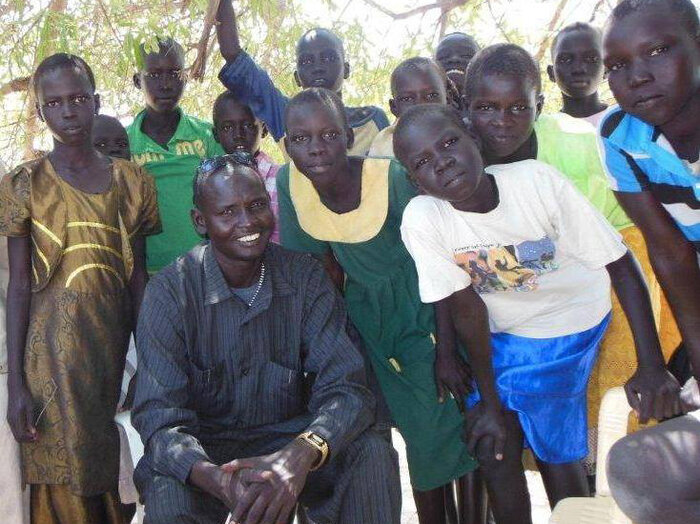 Daniel Majook Gai from South Sudan goes in and out of his war-torn country to help children there go to school.