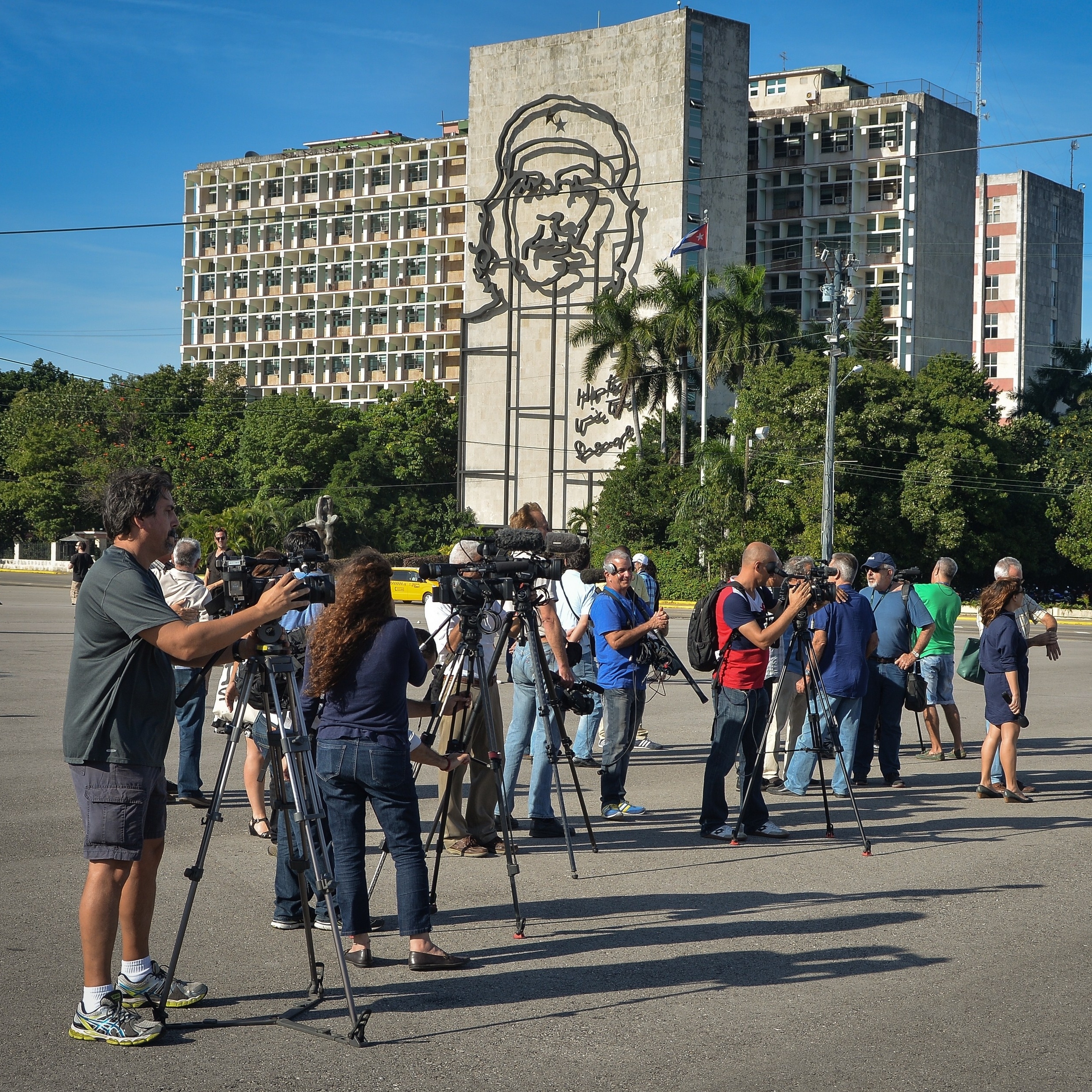 Journalists wait for Cuban performance artist Tania Bruguera at Revolution square in Havana, on Wednesday.