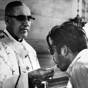 Archbishop Oscar Romero offers the host wafer during Mass in San Salvador in January 1980, four months before he was assassinated.