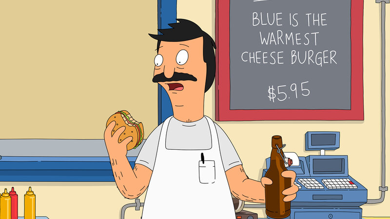 Bob Belcher, titular hero of Bob's Burgers, bites into one of his creations. Each episode features daily burger specials with chuckle-inducing names. The burgers were born in the show writers' imagination and brought to life in Cole Bowden's kitchen.