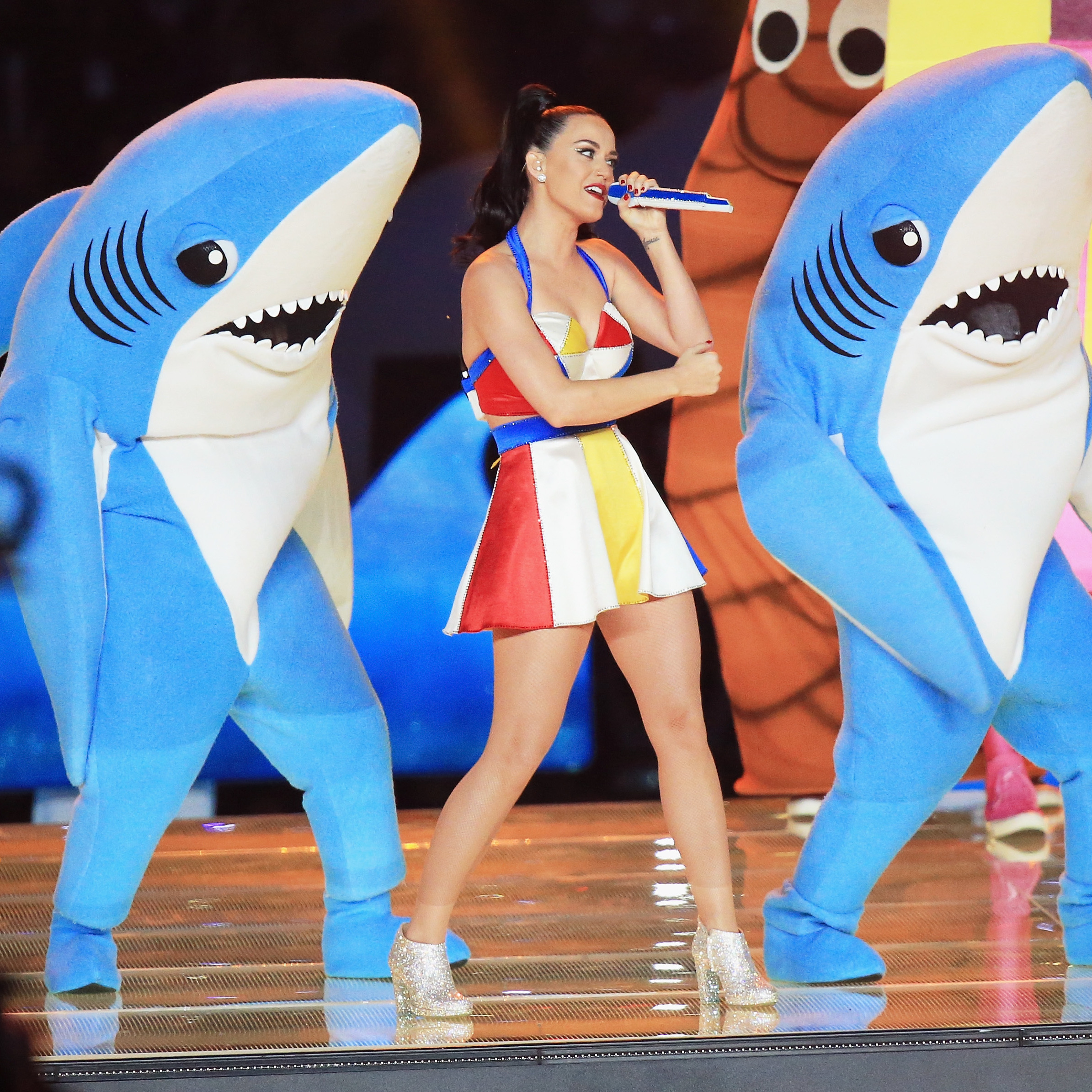 Katy Perry dances with a couple of sharks during the Super Bowl halftime show.