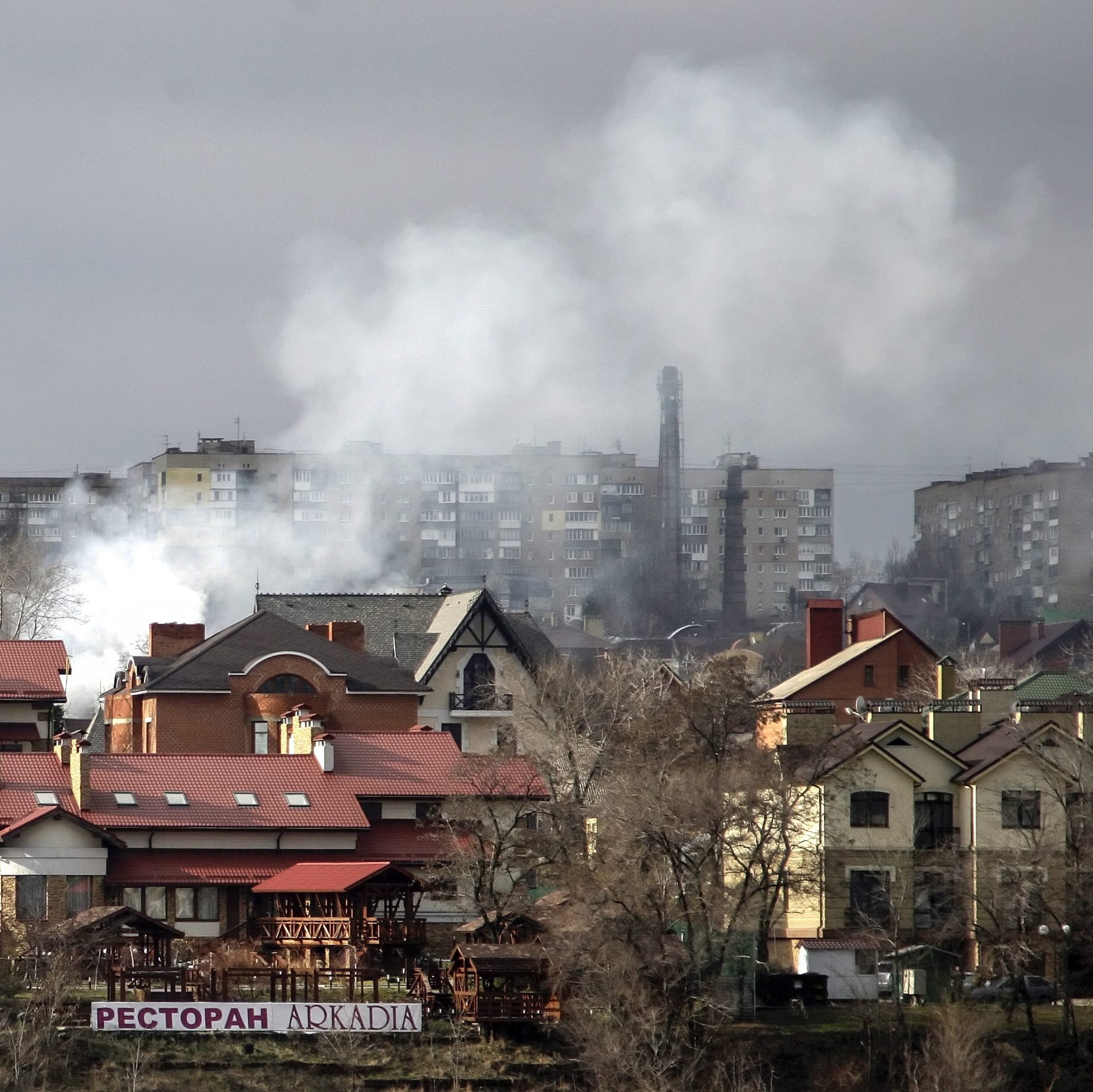 Smoke rises above buildings after shelling in Donetsk, Ukraine, on Tuesday. The number of people who have been killed in the conflict in eastern Ukraine has climbed to 5,358, with the escalating violence claiming an average of 10 lives per day in the past few weeks, the U.N. says.