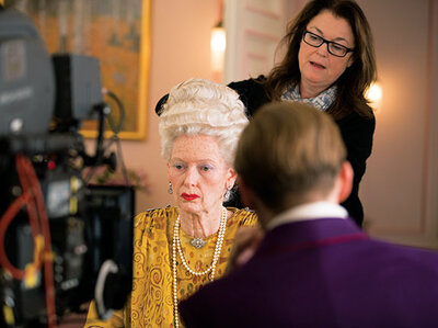 Oscar-nominated hair and makeup designer Frances Hannon styles actress Tilda Swinton on the set of The Grand Budapest Hotel.