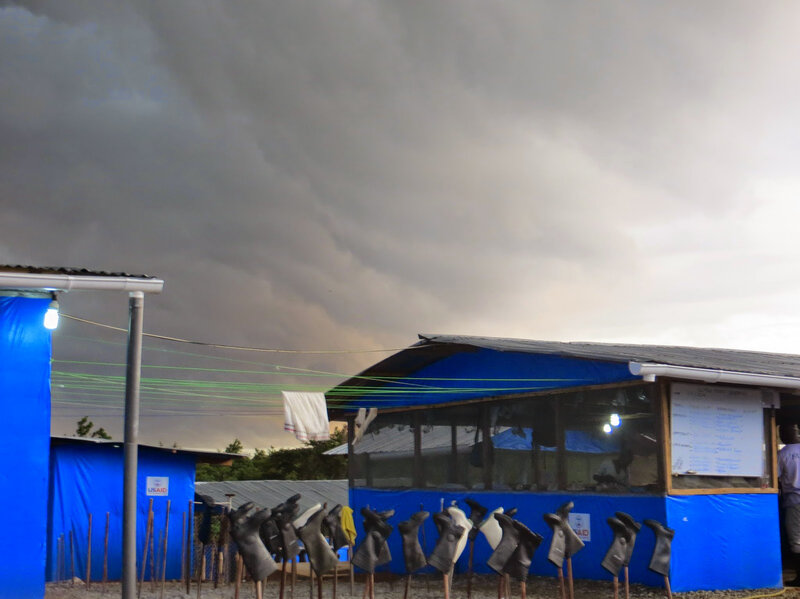 One morning, Dr. Kwan Kew Lai and another nurse went into the treatment center at 3 a.m. to administer IV fluids. Deafening thunder and rain came pelting on the tin roof.