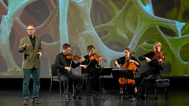Robert Davies (standing) and the quartet during a performance of "The Crossroads Project." Musicians include (left to right) Robert Waters, Rebecca McFaul, Anne Francis Bayless and Bradley Ottesen. (Courtesy of The Crossroads Project)