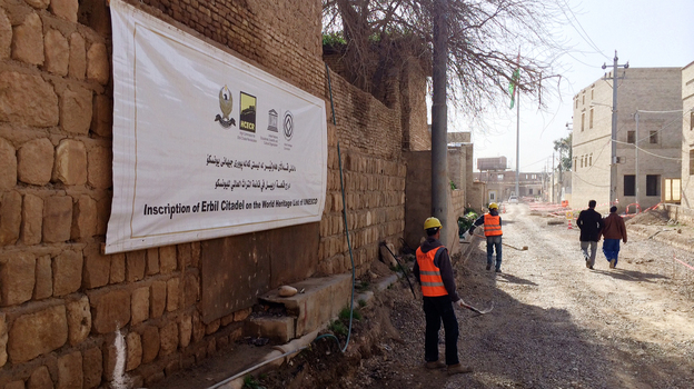 Construction workers at the Erbil Citadel, which was named a UNESCO World Heritage Site last year. (NPR)