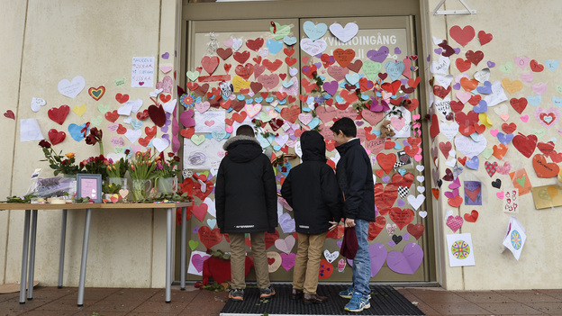 Boys in Uppsala, Sweden, read supportive messages placed at the entrance of a mosque following an attack in January. A new Pew study finds that religious intolerance is a global problem, with Muslims facing more hostility from individuals, and Christians from governments. Targeting of Jews, the study found, has gotten worse over in recent years. (AP)
