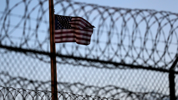 Relatives of victims of the Sept. 11 attacks are periodically flown down to Guantanamo Bay, Cuba, to witness court proceedings against five men accused of plotting the attacks. For the witnesses of the most recent court session, the experience raised questions about justice, humanity and the ethics of the death penalty. (Getty Images)