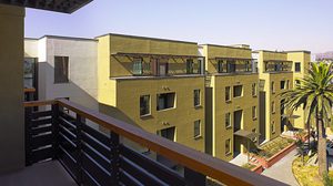 Faiza Ayesh says her family's new home in the Terraza Palmera apartments in Oakland, Calif., has gotten them away from lead paint and asthma triggers.
