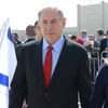 A handout image provided by the Israeli Government Press Office shows Prime Minister Benjamin Netanyahu and his wife, Sarah, leaving Tel Aviv on their way to Washington Sunday.
