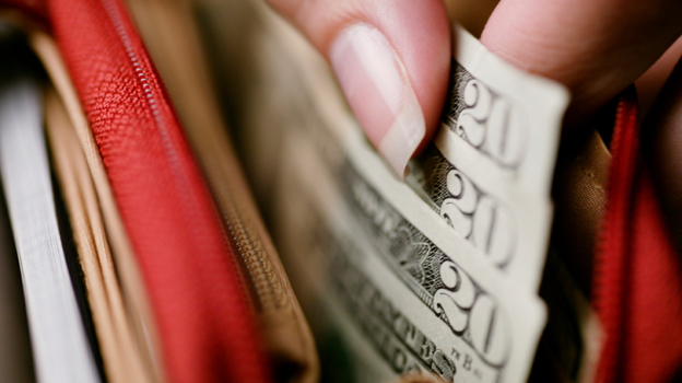 Bigger paychecks plus lower prices add up to more buying power for consumers. (iStockphoto)