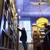 Fans are celebrating World Book Day Thursday. Here, a man browses through books at the Albertine, a French bookstore and library at the French Embassy in New York.