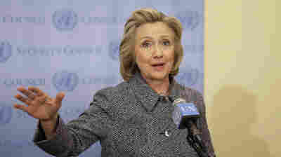 Former Secretary of State Hillary Clinton speaks to reporters Tuesday at United Nations headquarters, where she said she chose to use a personal email account for government business out of convenience.