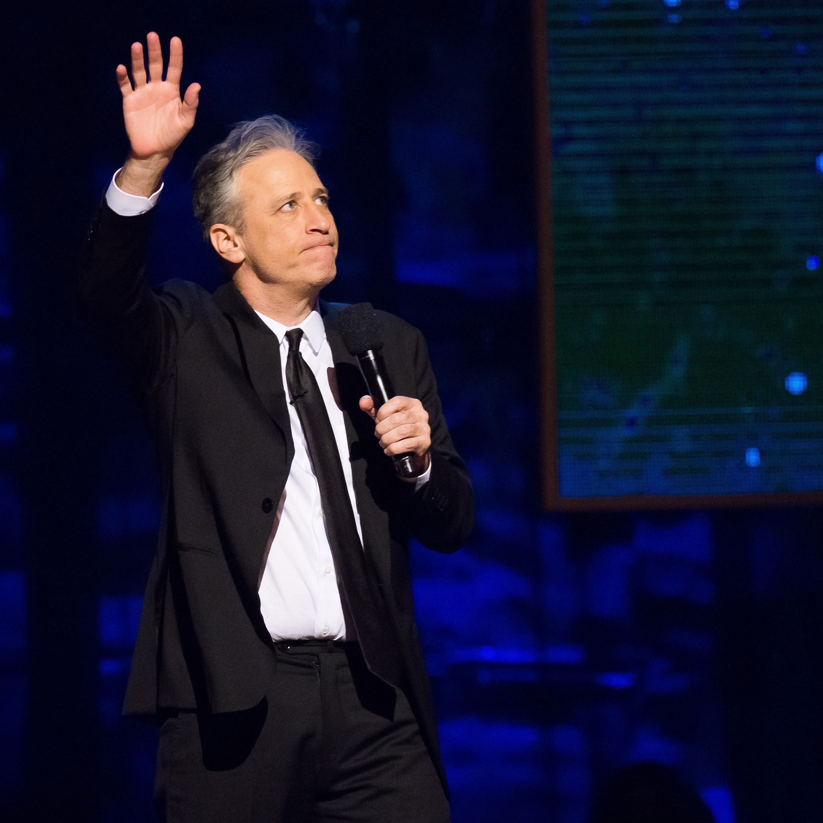 Jon Stewart appears onstage at Comedy Central's Night of Too Many Stars: America Comes Together for Autism Programs at the Beacon Theatre on Feb. 28 in New York. Stewart, host of The Daily Show, defended Trevor Noah, the man named to replace him, on the show Monday night.