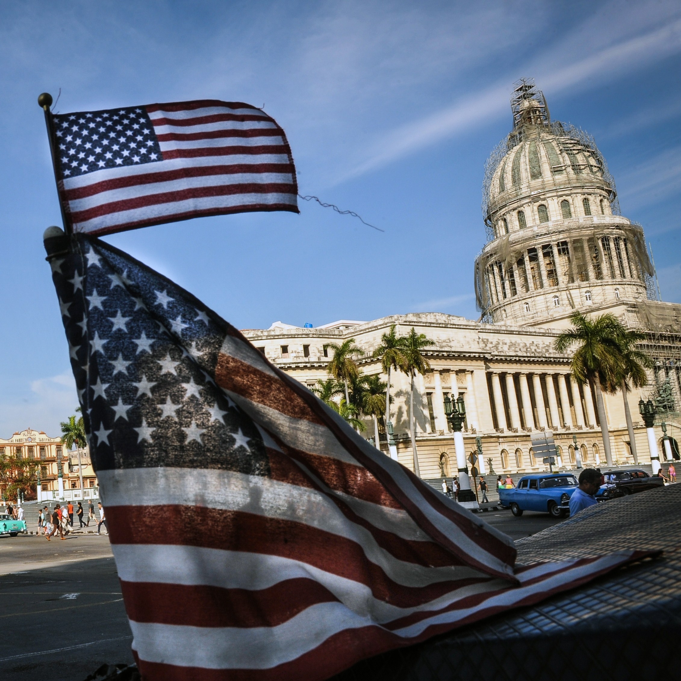 U.S. flags are seen in a bici-taxi near the capitol in Havana in January.