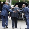 Mourners arrive for the funeral of Walter Scott at W.O.R.D. Ministries Christian Center in Summerville, S.C., on April 11, 2015.