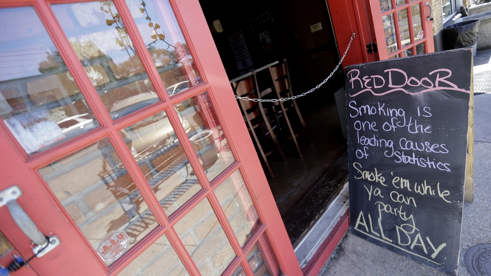 A sign outside The Red Door lounge last weekend warned about the impending smoking ban in New Orleans.
