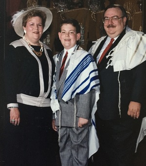 Charles Ornstein with his parents at his Bar Mitzvah. Through their voice messages, saved on his phone, Ornstein has a trove of verbal memories.