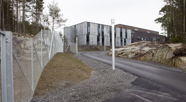 The prison in Halden, Norway, shown here in April 2010, is surrounded by a 25-foot-high concrete wall and little else to suggest it's a maximum-security facility. The emphasis is on treating the prisoners with respect and giving them the skills to reintegrate into society when they leave.