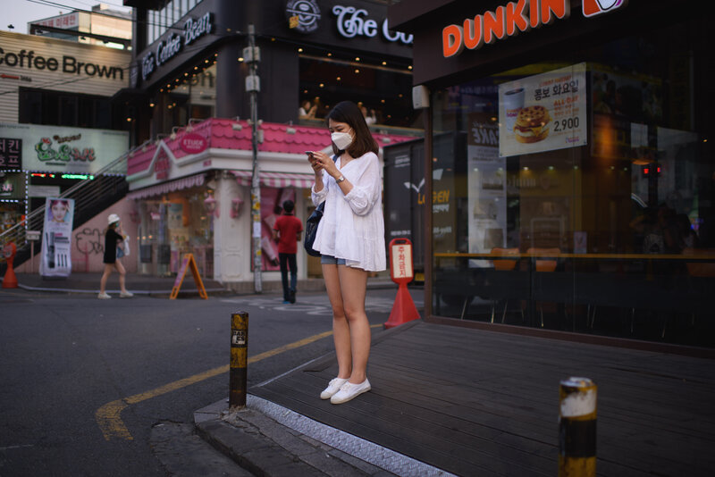 A woman on a street in Seoul checks her cellphone. The government is ramping up efforts to control an outbreak of the Middle East respiratory syndrome by monitoring the smartphones of those under quarantine. A woman on a street in Seoul checks her cellphone. The government is ramping up efforts to control an outbreak of the Middle East respiratory syndrome by monitoring the smartphones of those under quarantine.