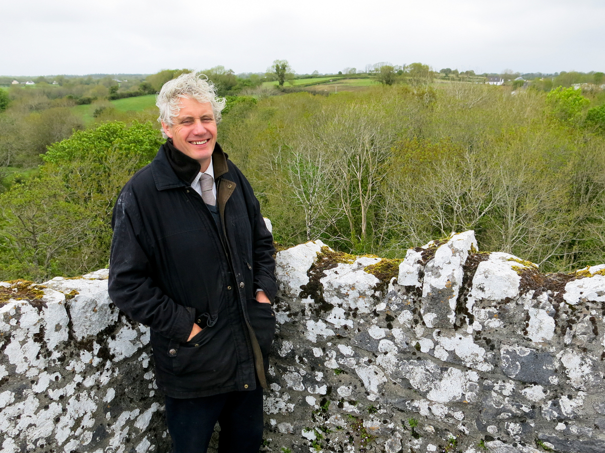Colm Farrell, whose grandfather knew Yeats, stands atop Thoor Ballylee. Farrell is helping raise money to restore the tower and reopen it to the public.