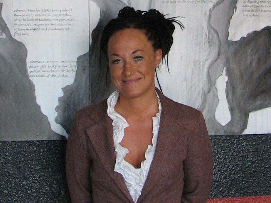 Rachel Dolezal stands in front of a mural she painted, in July 2009.