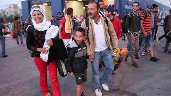 Some 800 migrants from the Middle East arrive at the Greek port of Piraeus on Sunday. Smugglers are charging thousands of dollars to take migrants across the Mediterranean, and prices can vary widely. Children are often allowed to travel for free.