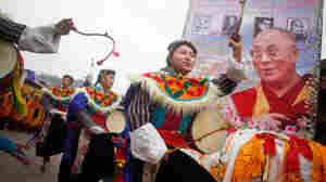 Tibetan men living in Kathmandu, Nepal, danced Monday during celebrations to mark the 80th birthday of the Dalai Lama.