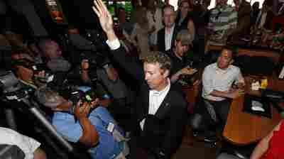 Sen. Rand Paul waves to supporters in Denver after he spoke to a closed meeting of cannabis business leaders earlier in the day.