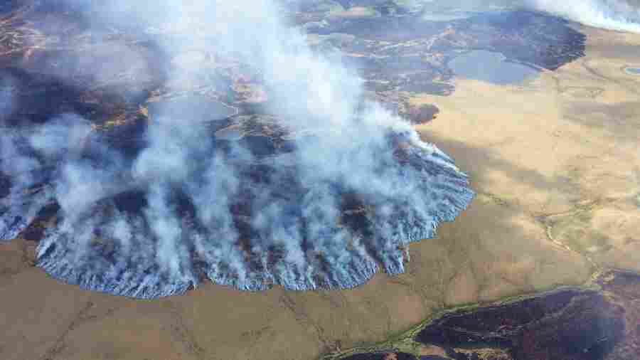 Smoke rises from the Bogus Creek Fire, one of two fires burning in the Yukon Delta National Wildlife Refuge in southwest Alaska.