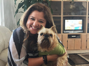 Laura Steveson and her dog Monchichi. When Monchichi went missing, Steveson's husband uploaded a photo to Finding Rover. Minutes later, Steveson received an email that her dog was safe and found at the San Diego County Department of Animal Services.