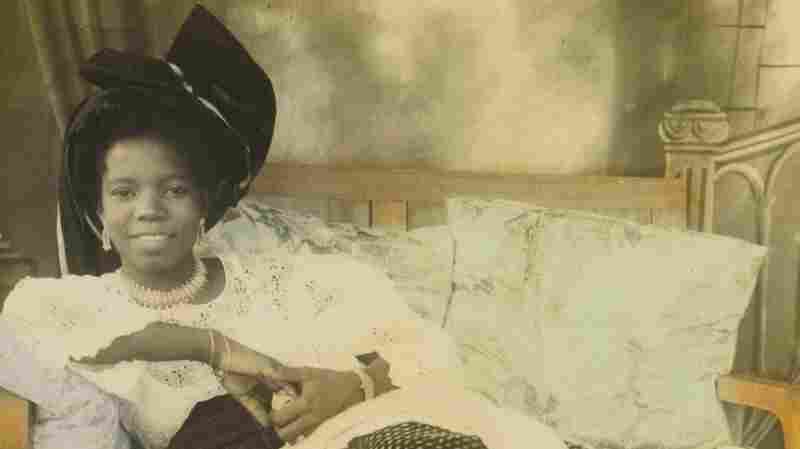 The hand-colored photo, titled "Reclining young lady," is of Stella Osarhiere Gbinigie when she was 16.