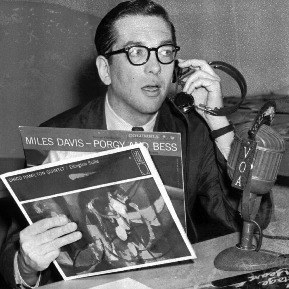Willis Conover, an expert on jazz, broadcasts "Music USA" from his Voice of America studio in Washington in March 1959.